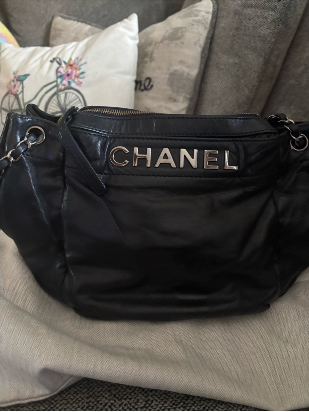 Chanel Lambskin skin with embossed lettering
